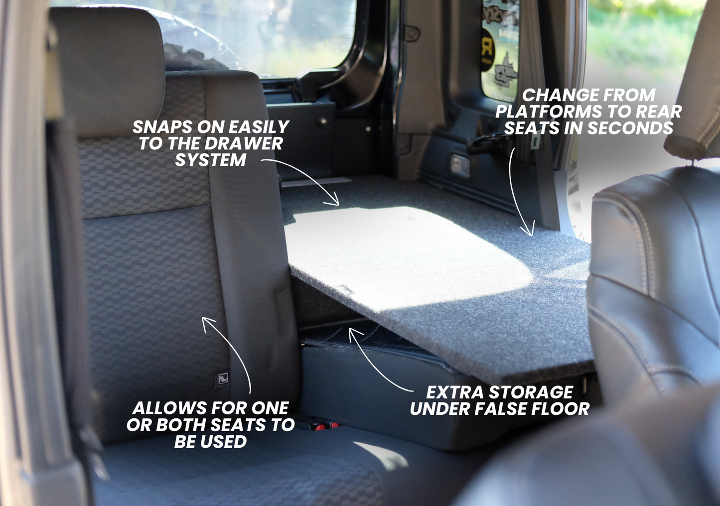 Suzuki Jimny false floor platform installed in rear seat area showing extra storage and seat adjustment